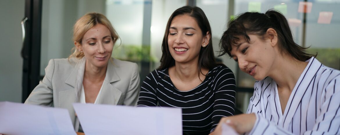 Businesswoman Making Business Presentation For Colleagues In Modern Office