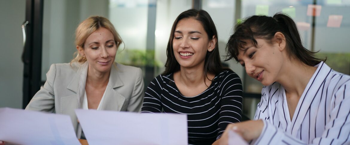 Businesswoman Making Business Presentation For Colleagues In Modern Office
