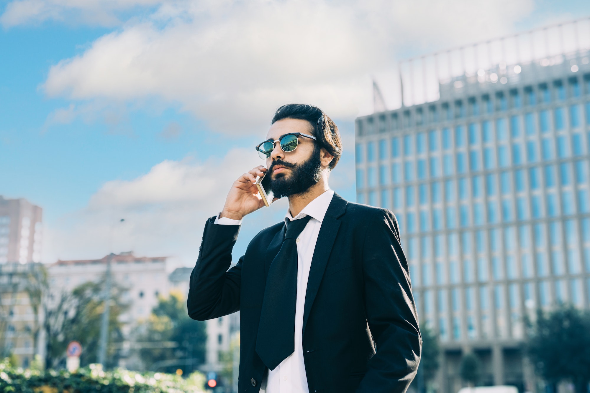 Young businessman outdoor using smartphone Young businessman outdoor using smartphone