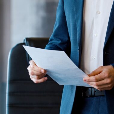 Young corporate leader in a suit at a business meeting